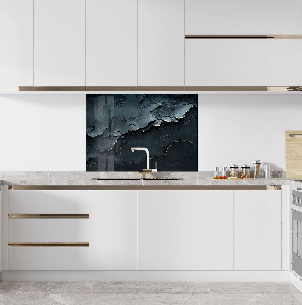 Bold and elegant kitchen backsplash glass art showcasing a moody cracked rock pattern with golden highlights.

