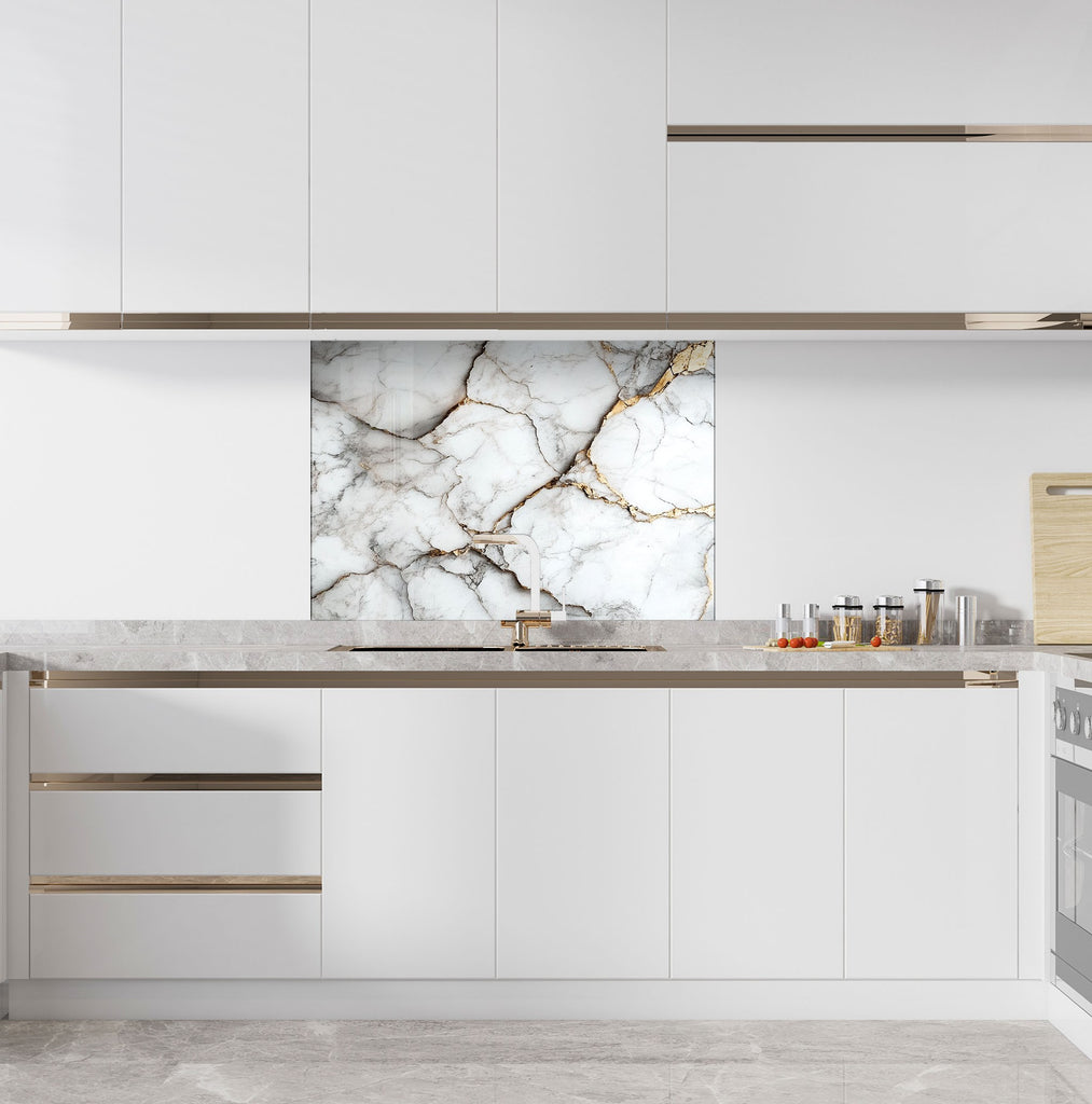 Premium white marble kitchen backsplash with metallic gold accents for sophisticated decor.

