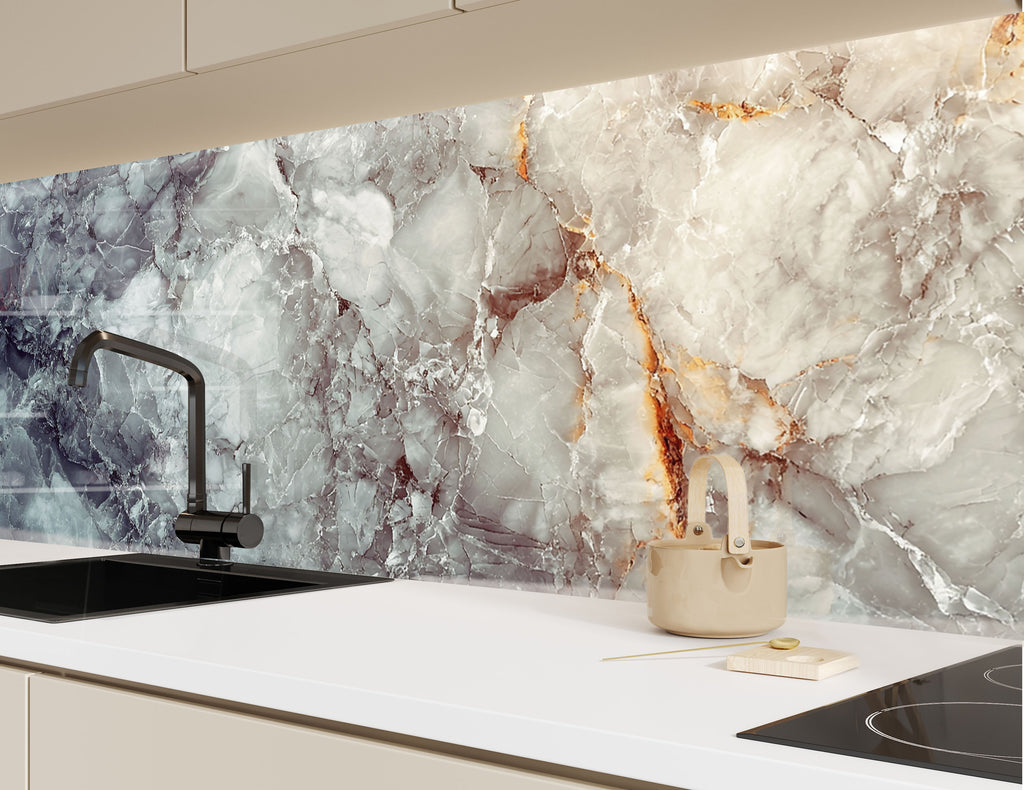Luxurious stone-effect backsplash glass with soft neutral hues and dynamic golden accents.

