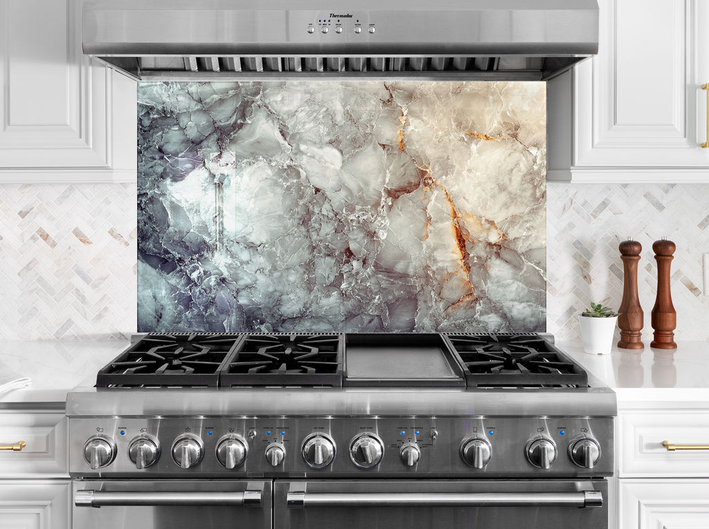 Backsplash glass art with marble-inspired pattern in smoky grey and ivory tones for timeless kitchen luxury.

