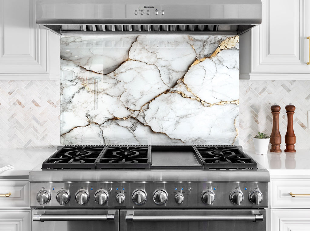 White marble glass backsplash with dramatic gold veins – a stunning kitchen upgrade.

