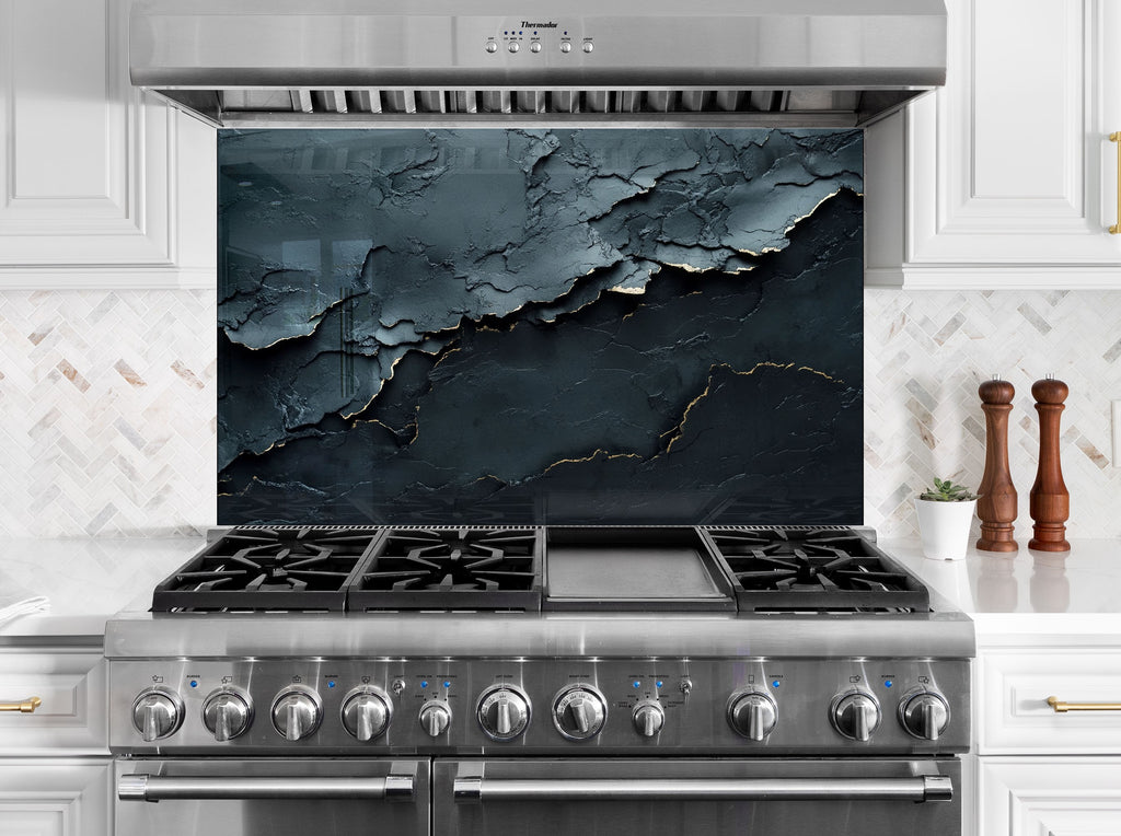 Luxury backsplash glass panel featuring deep black and gold fractured design, ideal for high-end kitchen interiors.

