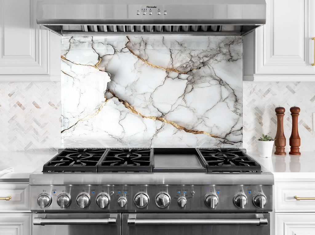 Luxury backsplash glass with white marble and gold vein pattern for upscale kitchen decor.

