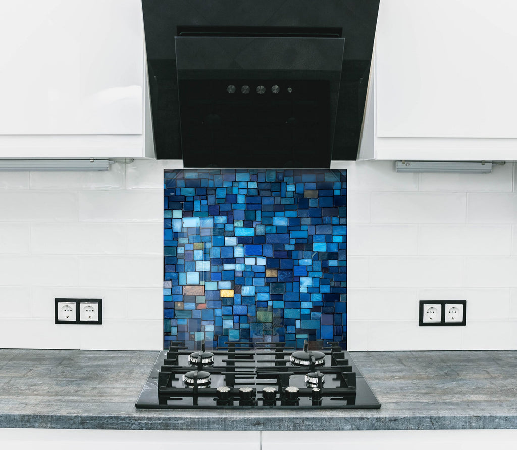 Elegant kitchen backsplash featuring shades of blue mosaic artistic textured backsplash glass art ideal for contemporary designs

