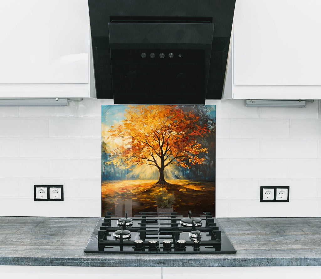 Backsplash glass art with golden autumn tree design, bringing warmth and elegance to luxury kitchen spaces.

