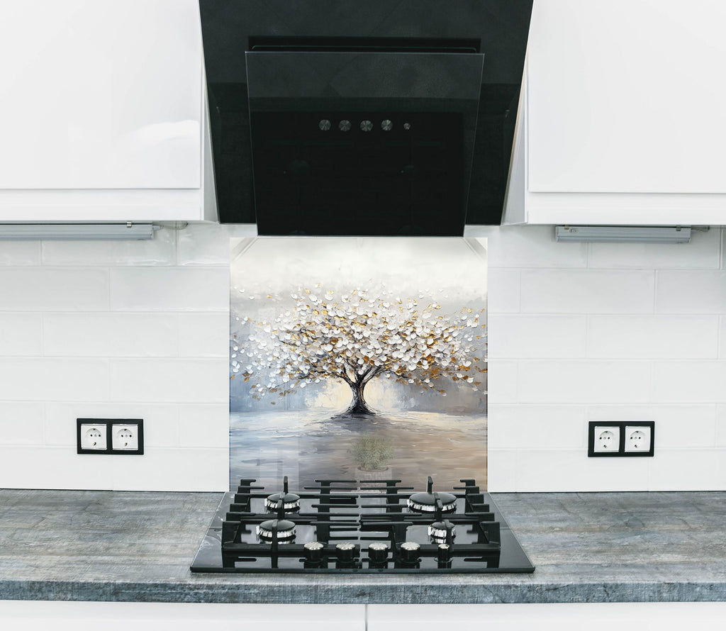 Backsplash glass art with textured golden blossom tree – a statement of elegance in luxury kitchens.

