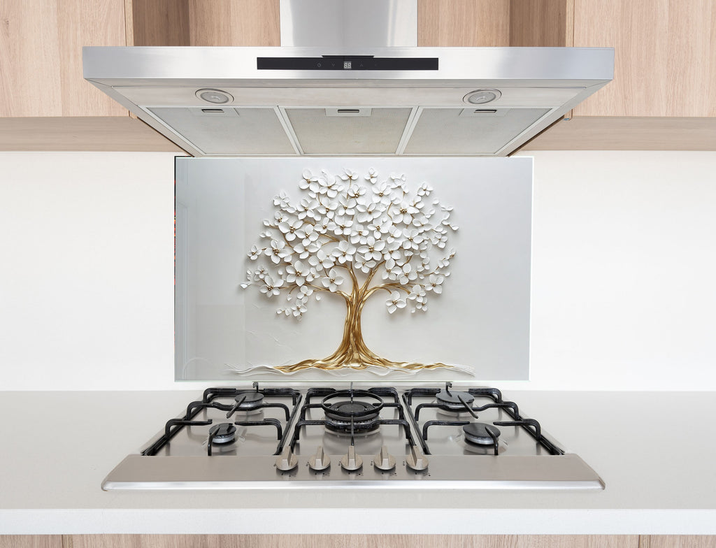 Elegant kitchen upgrade: white tree of life glass backsplash with gold detailing.

