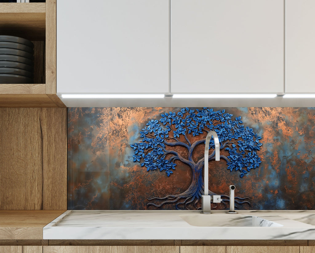 Stunning kitchen backsplash with blue metallic tree motif over oxidized copper effect glass.

