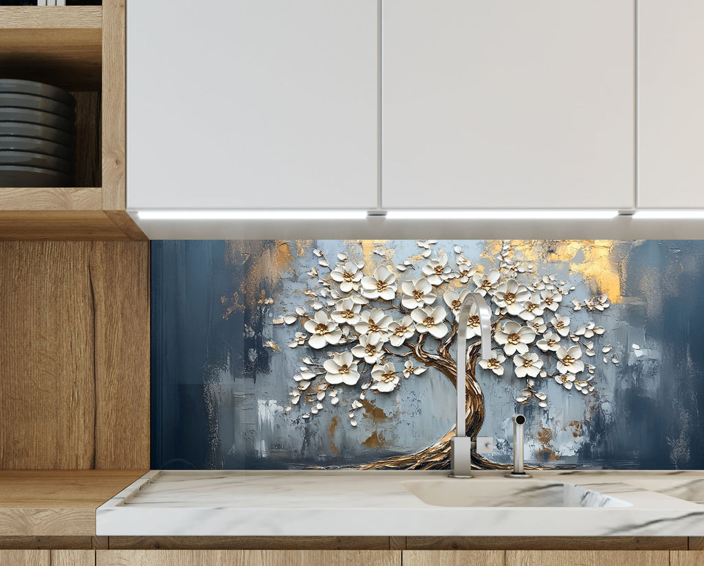 Elegant magnolia tree glass kitchen backsplash with gold highlights – refined and luminous.

