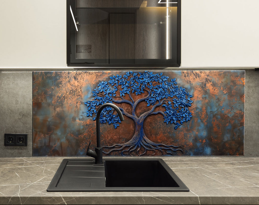 Decorative glass backsplash featuring a textured blue-leaf tree on rusted bronze background.

