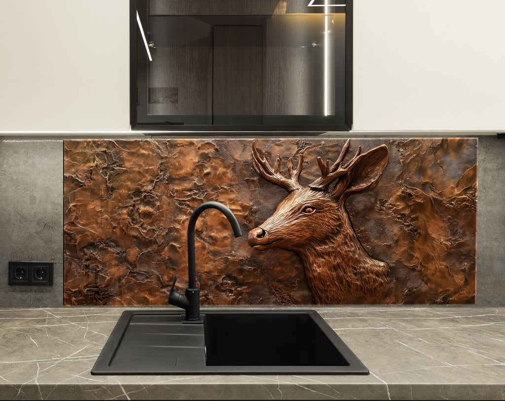 Elegant wildlife-inspired glass backsplash with sculpted deer motif in bronze finish.

