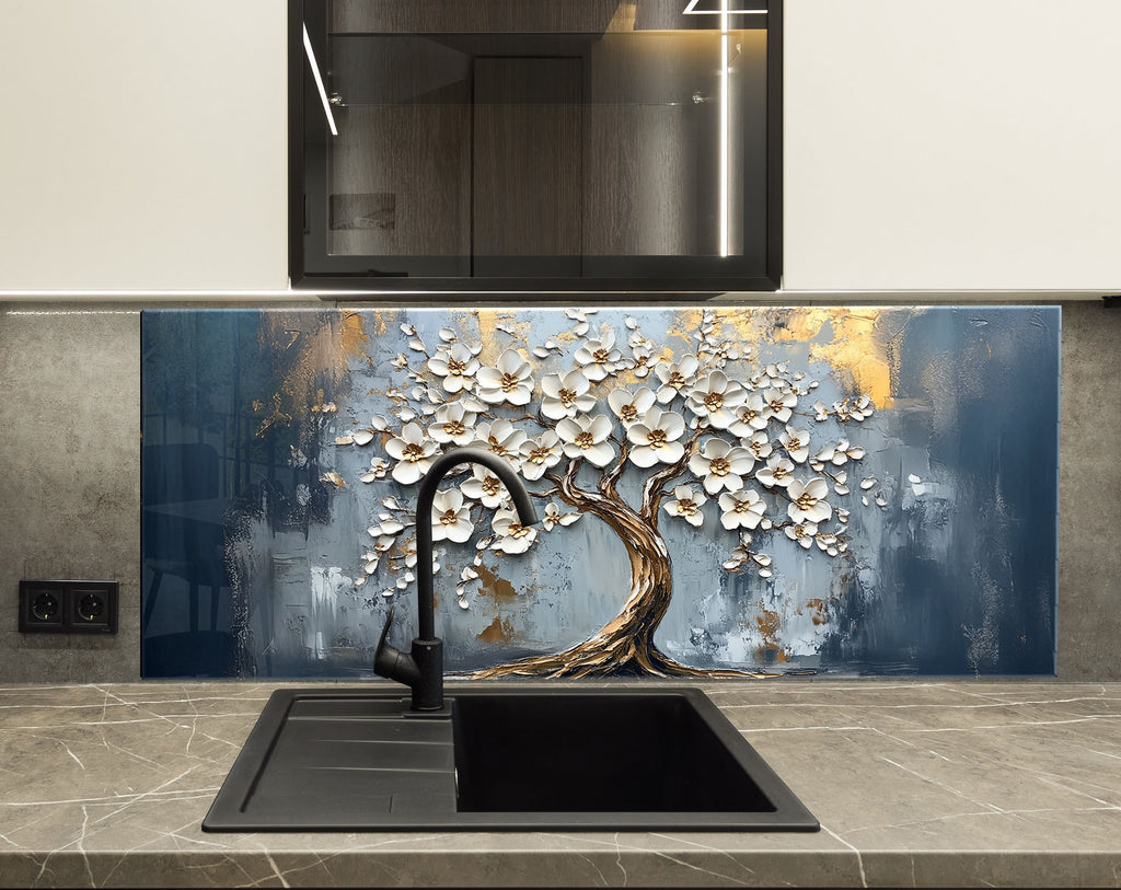 Sophisticated tree of life kitchen backsplash in glass with delicate white blossoms.

