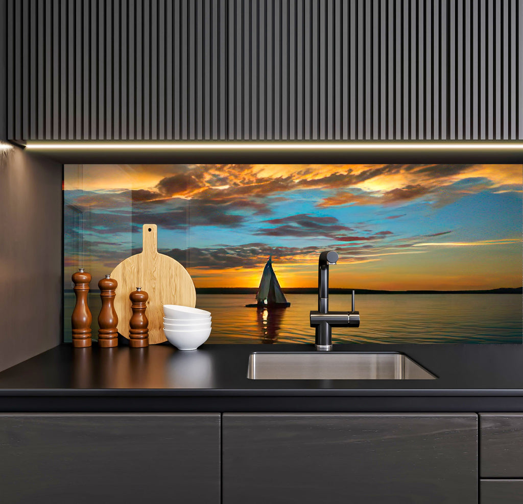 a kitchen with a sink and a painting on the wall