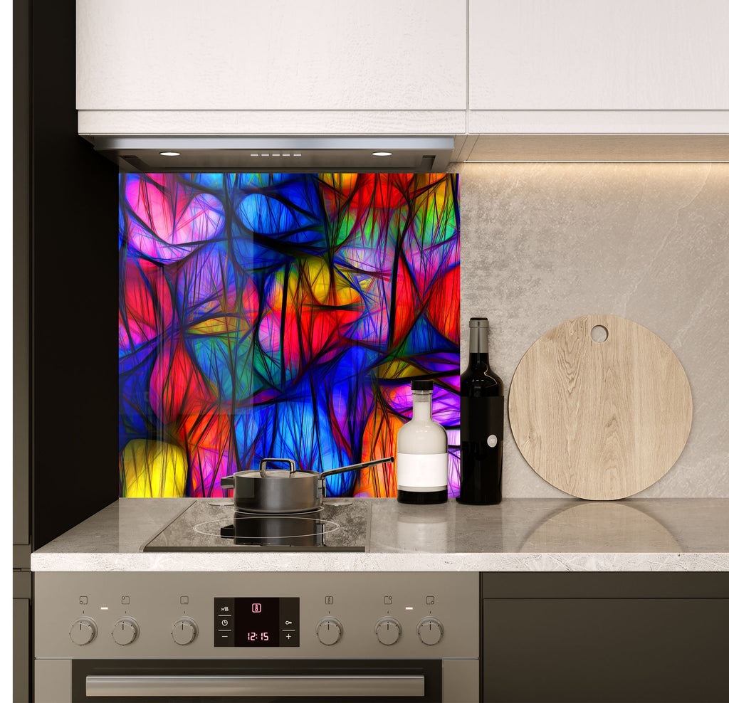 a stove top oven sitting under a colorful painting