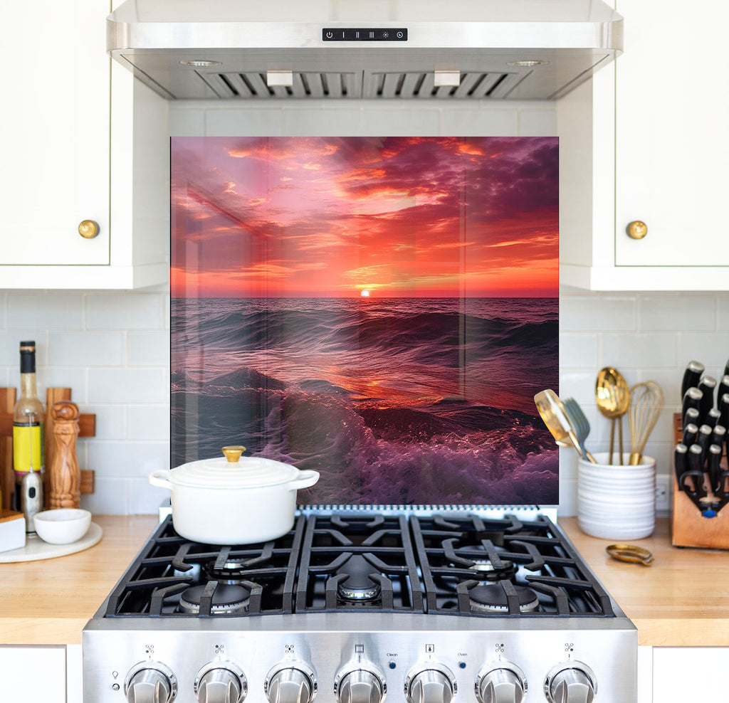 a picture of a sunset over the ocean