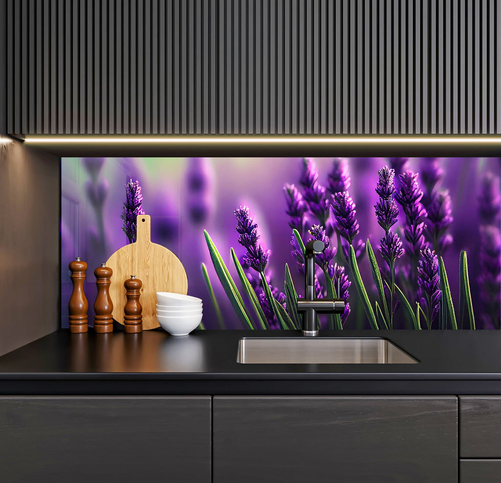 a kitchen counter with a sink and purple flowers