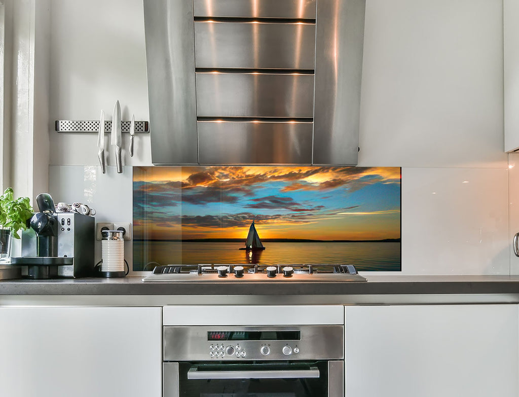 a kitchen with a stainless steel stove top oven