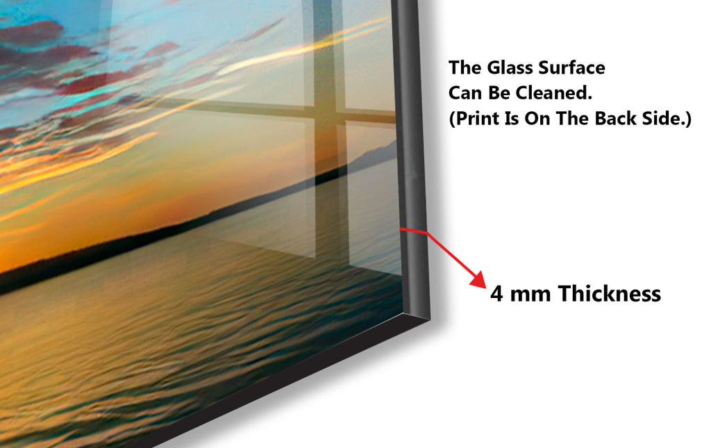 a picture of a sunset with a cross on it