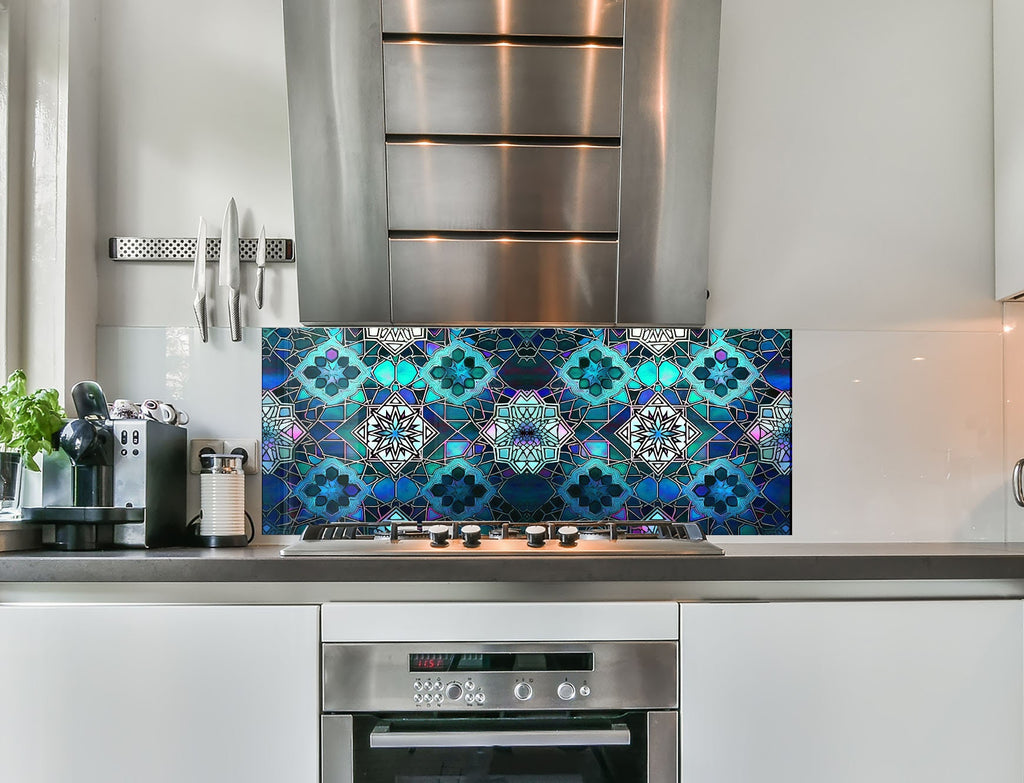 a stove top oven sitting inside of a kitchen